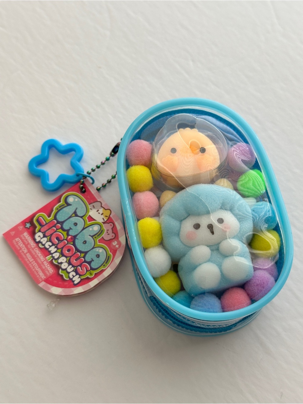 Taba-licious Gacha Pouch Keychain Blue with Colorful Pom-Poms New